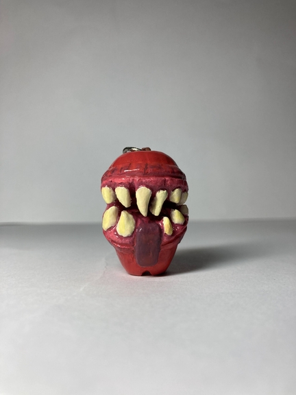 Apple mouth carving front